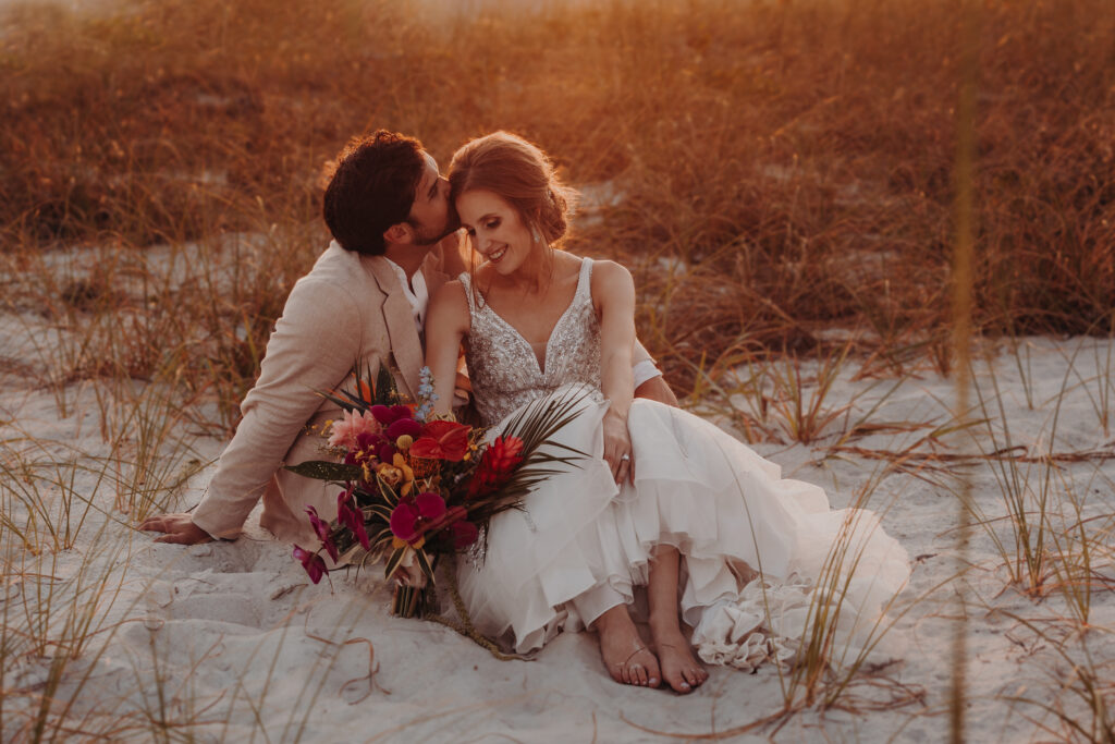 Modern beachfront wedding ceremony setup at Zota Beach Resort captured at sunset