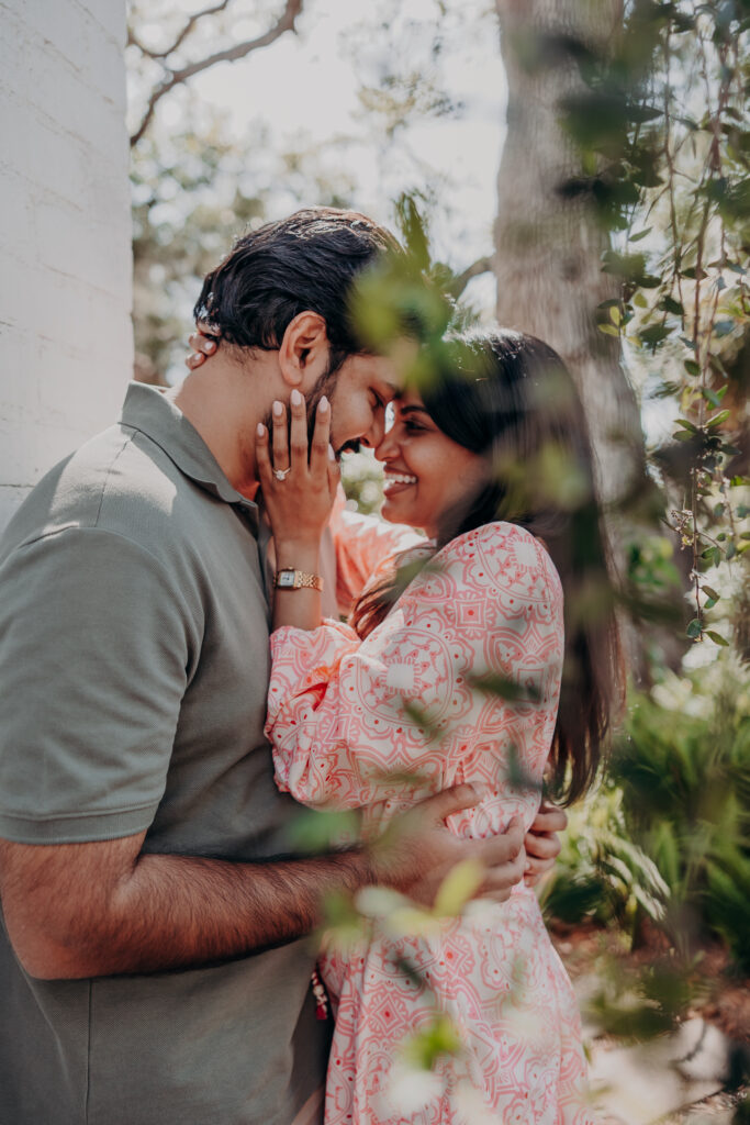 Romantic close moment of couple at Selby Botanical Gardens Sarasota after proposal