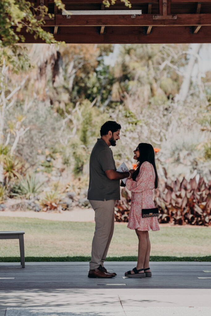Couple standing together at pavilion in Selby Botanical Gardens Sarasota