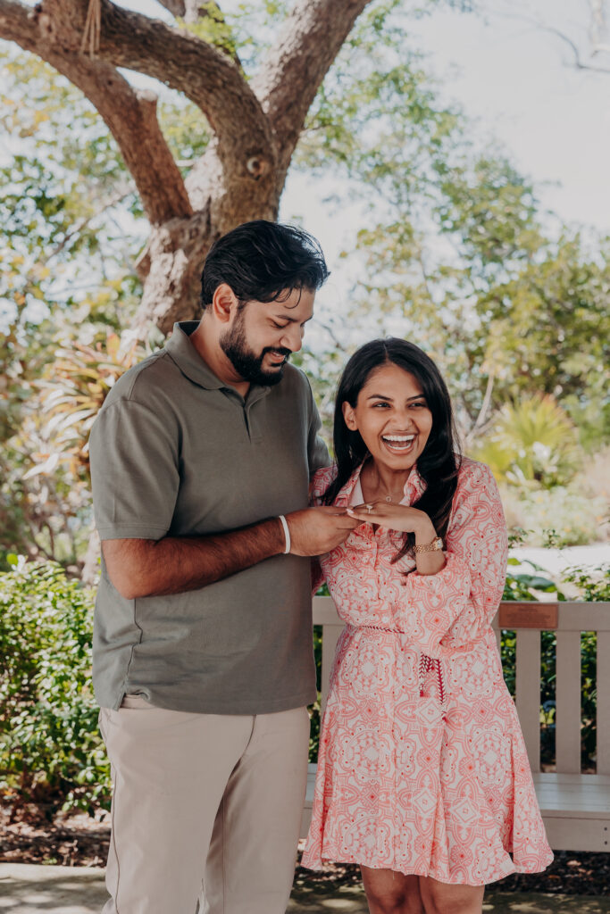 Happy couple celebrating engagement at Selby Botanical Gardens