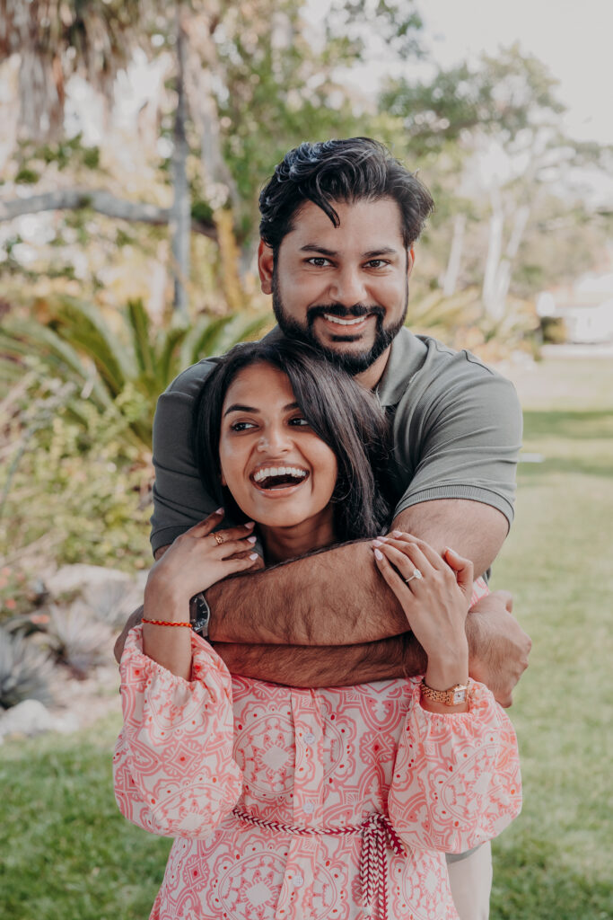 Just engaged couple smiling and celebrating at Selby Botanical Gardens Sarasota