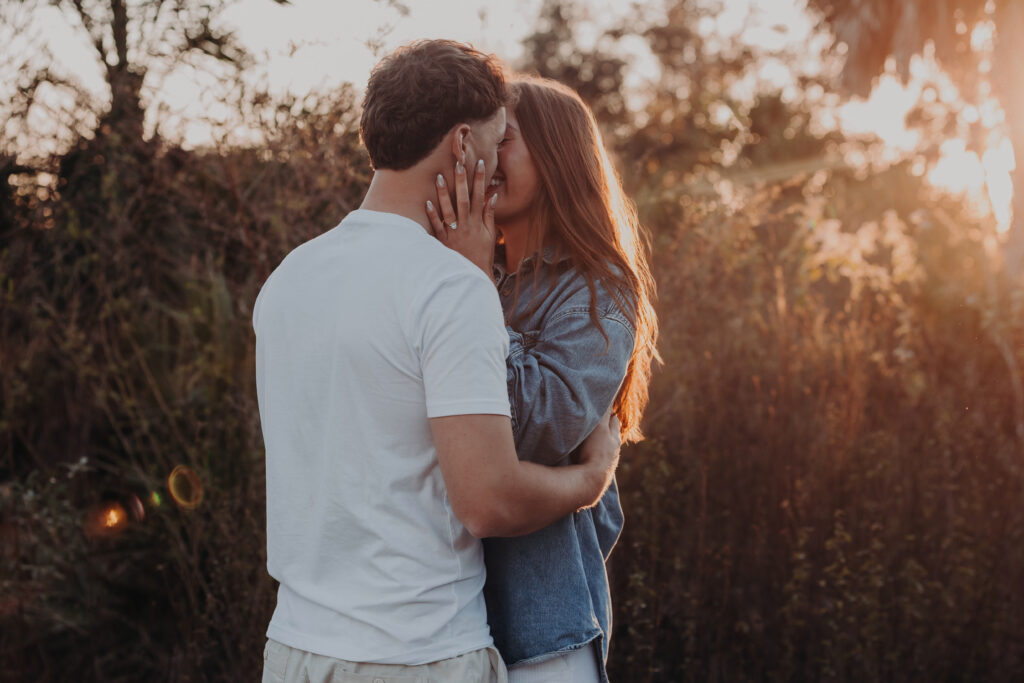 Romantic engagement moment at Celery Fields Sarasota during golden hour