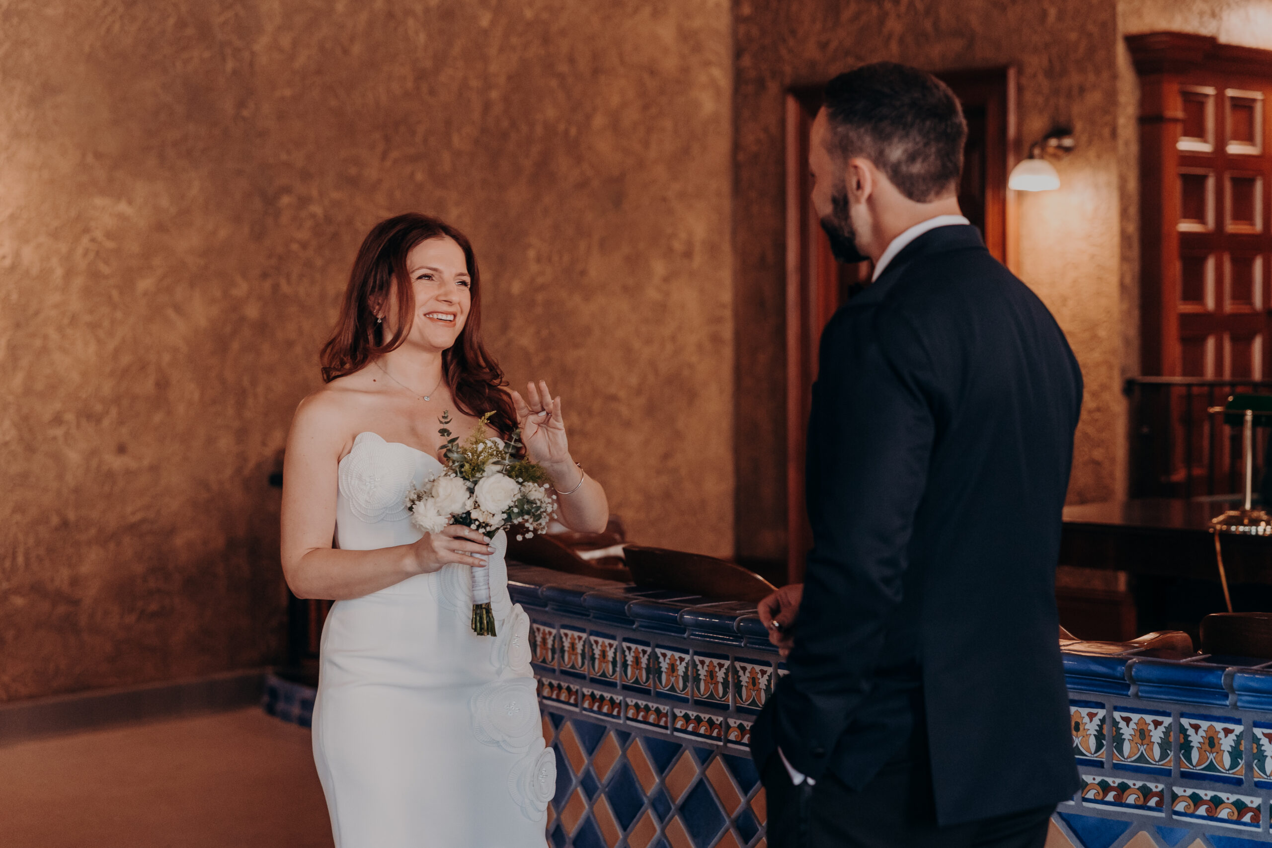 Diana smiling and gesturing during wedding ceremony at the Historic Sarasota County Courthouse in Sarasota Florida