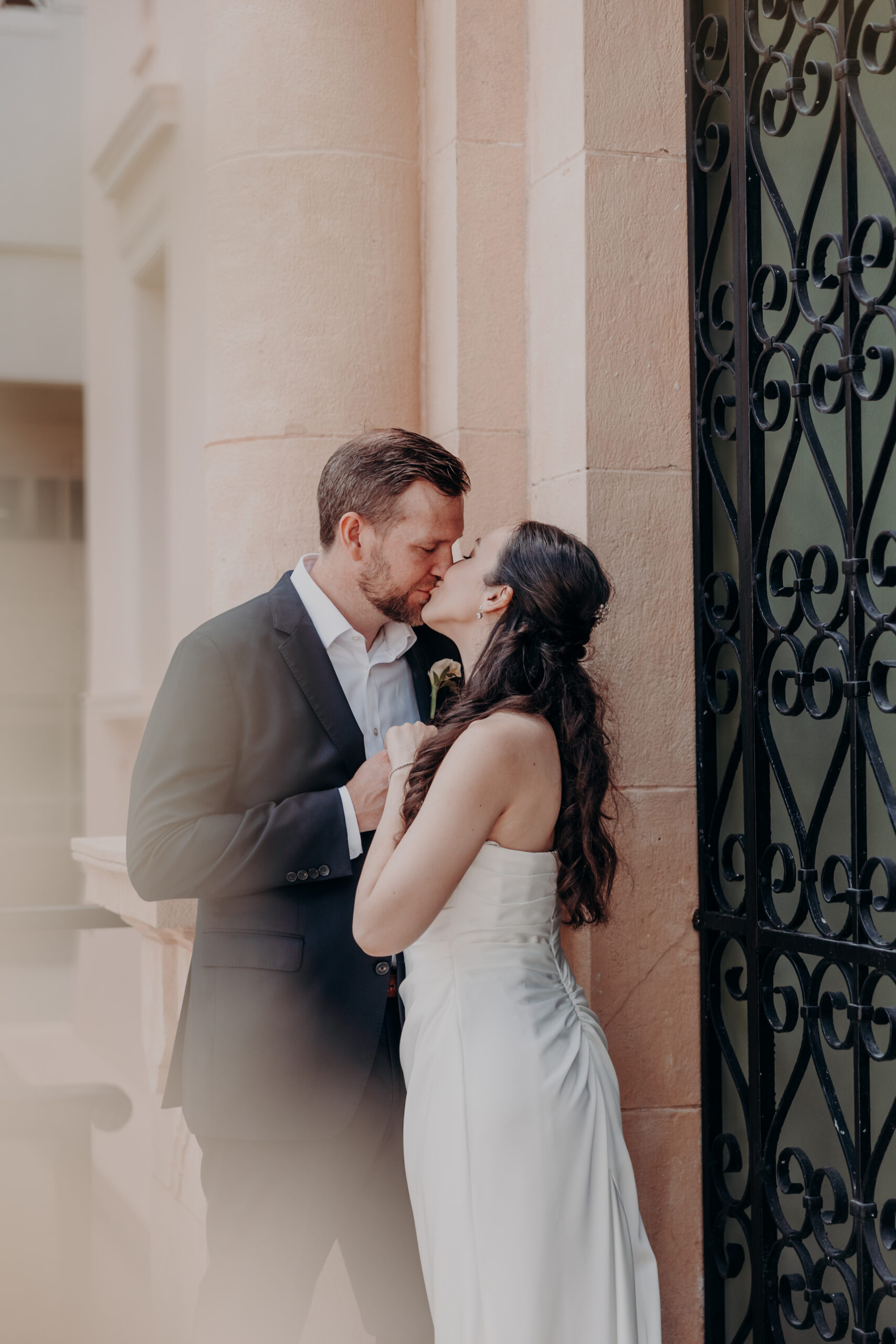 Liza and Will final portrait of the day in soft morning light at the Historic Sarasota County Courthouse