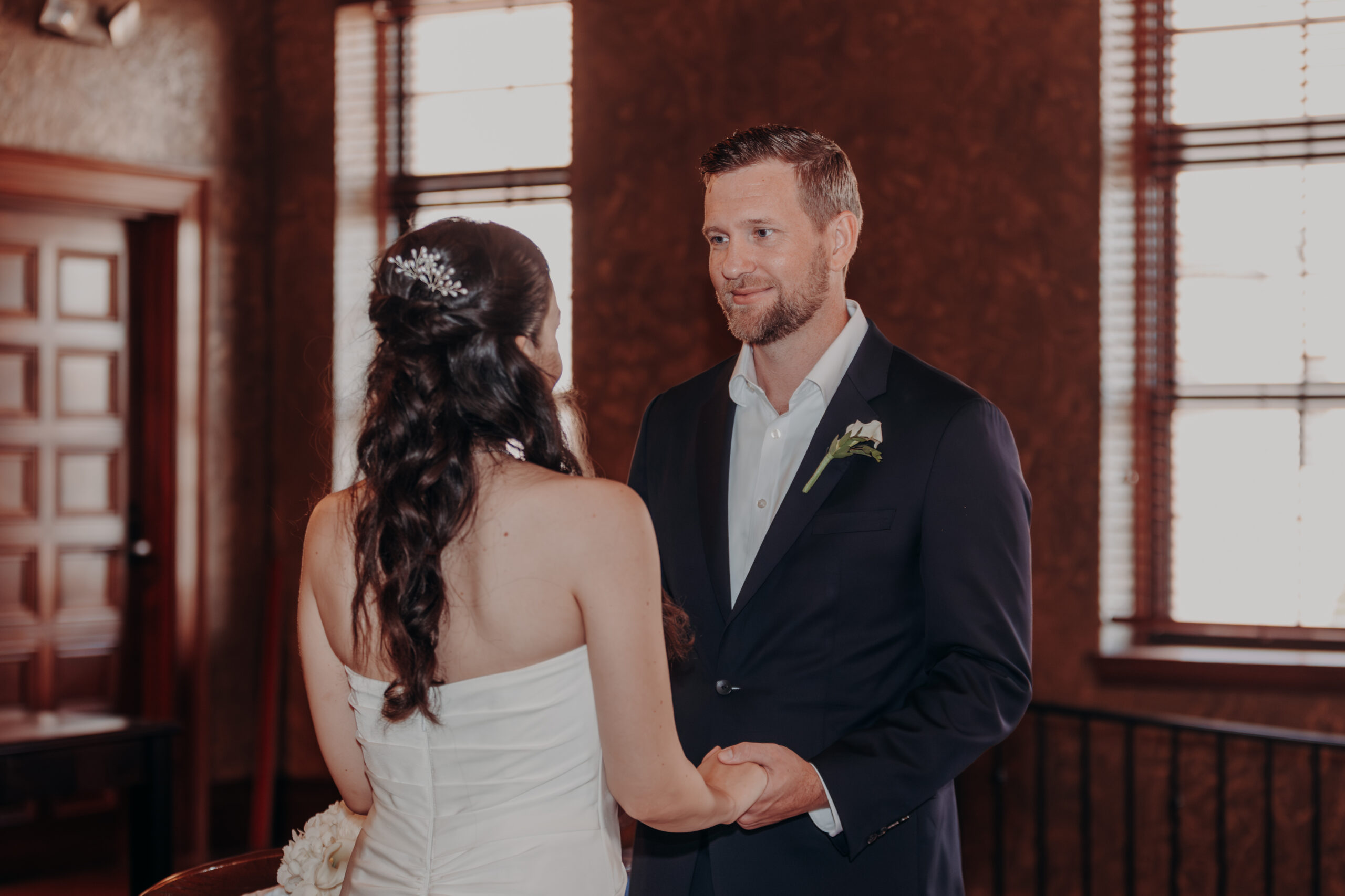 Will spinning Liza in her wedding dress in front of the Sarasota courthouse archway