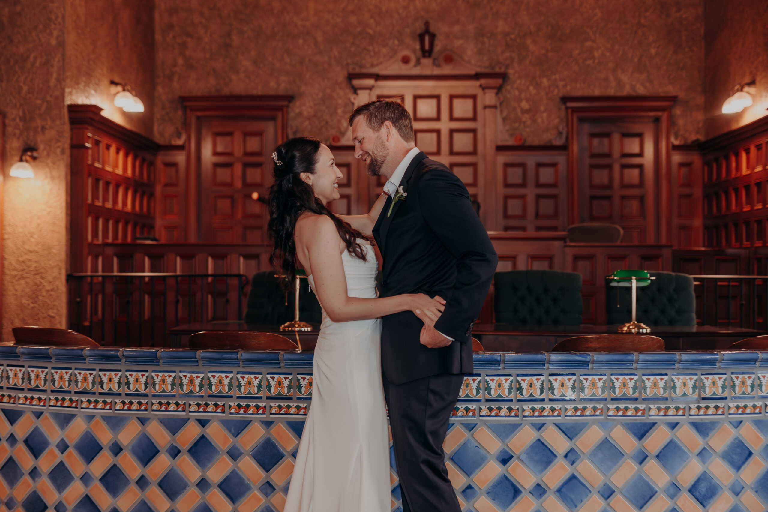 Will twirling Liza in her wedding dress in the sunlit courtyard of the Sarasota courthouse