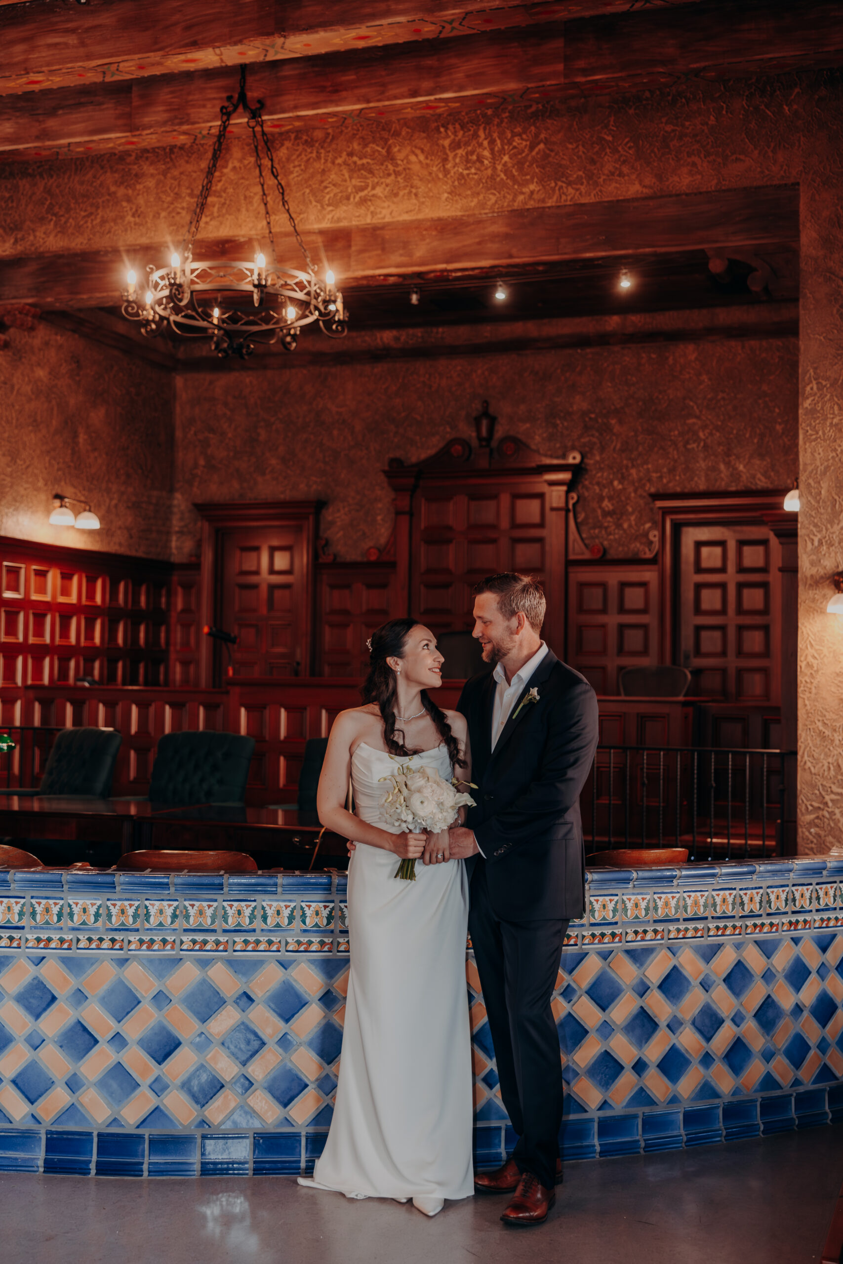 Liza and Will forehead to forehead in a quiet moment at the Sarasota Historic Courthouse