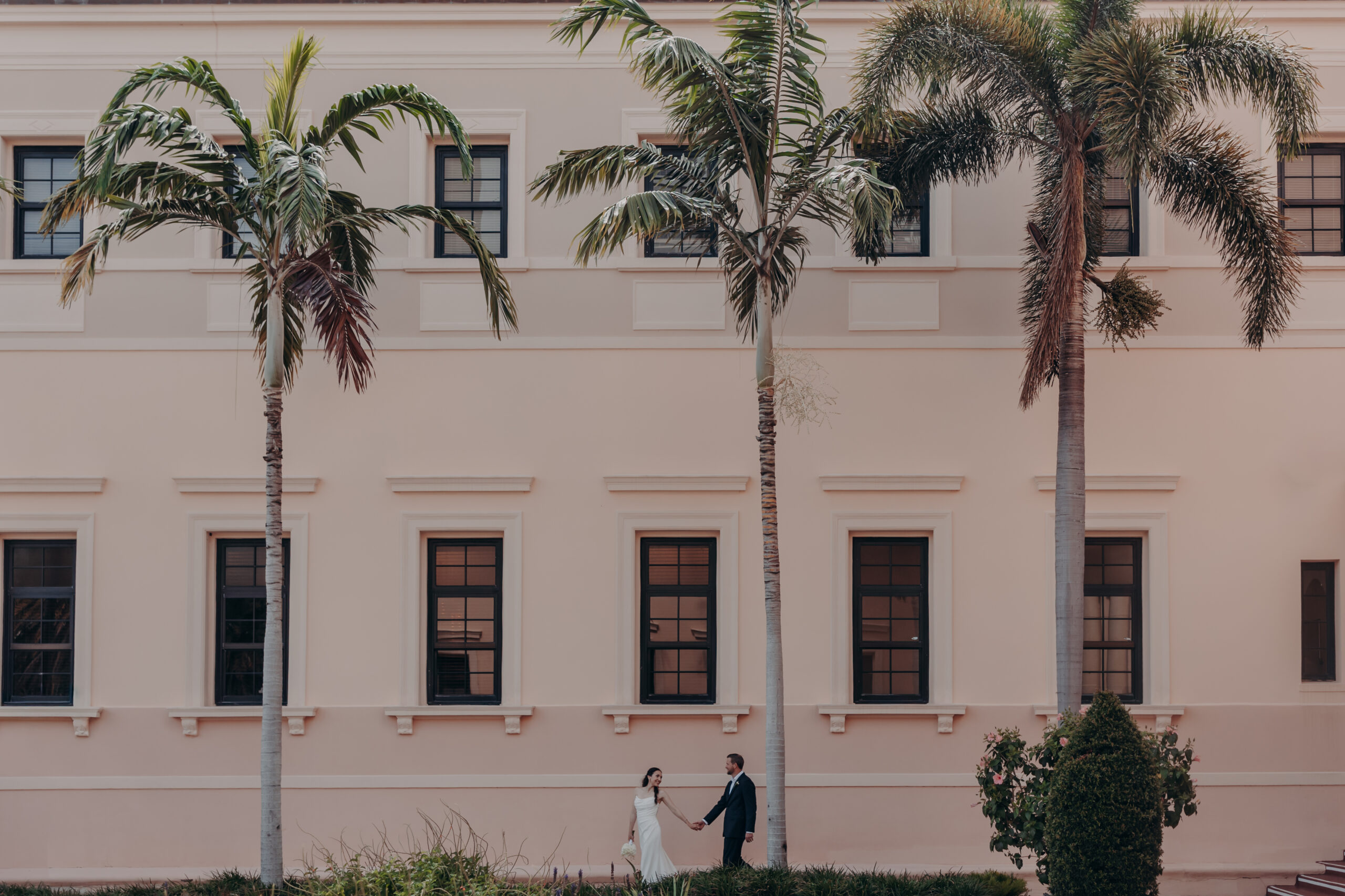 Liza and Will portrait from above in the open courtyard of the Sarasota Historic Courthouse Sarasota FL