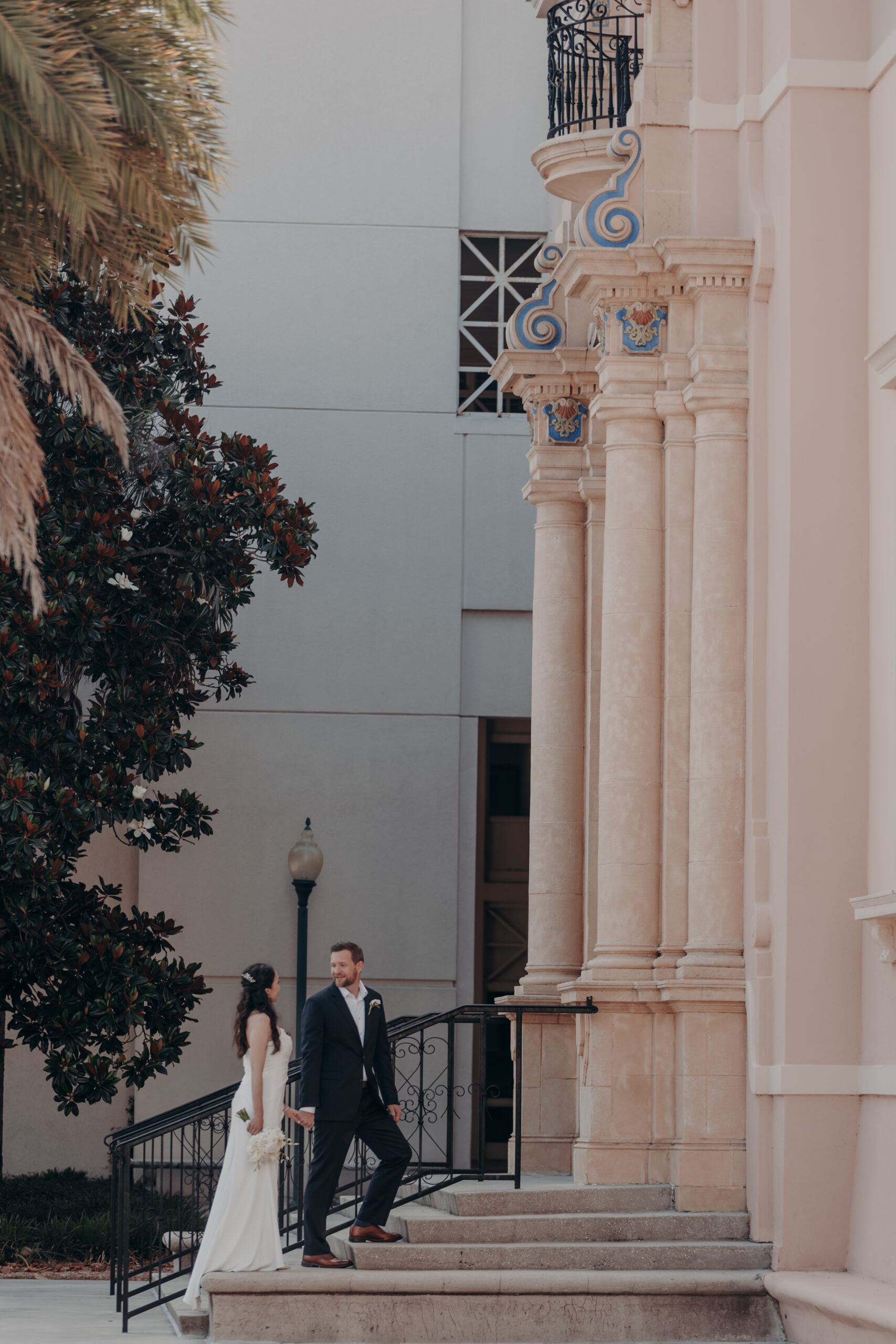 Liza looking up at Will with a joyful expression during their Sarasota FL courthouse wedding portraits