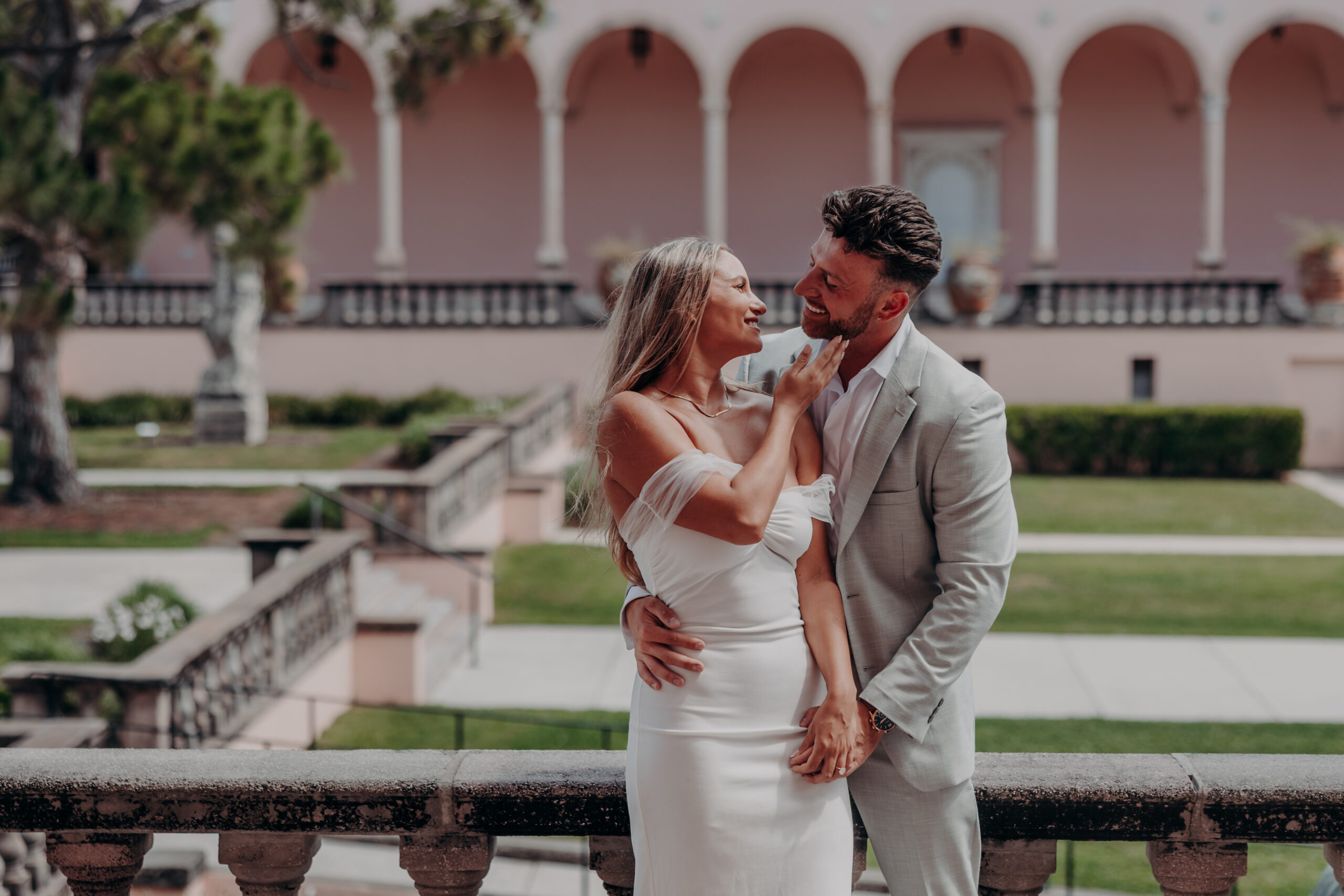 Nicole showing off her engagement ring surrounded by family at the Ringling Museum Sarasota Florida