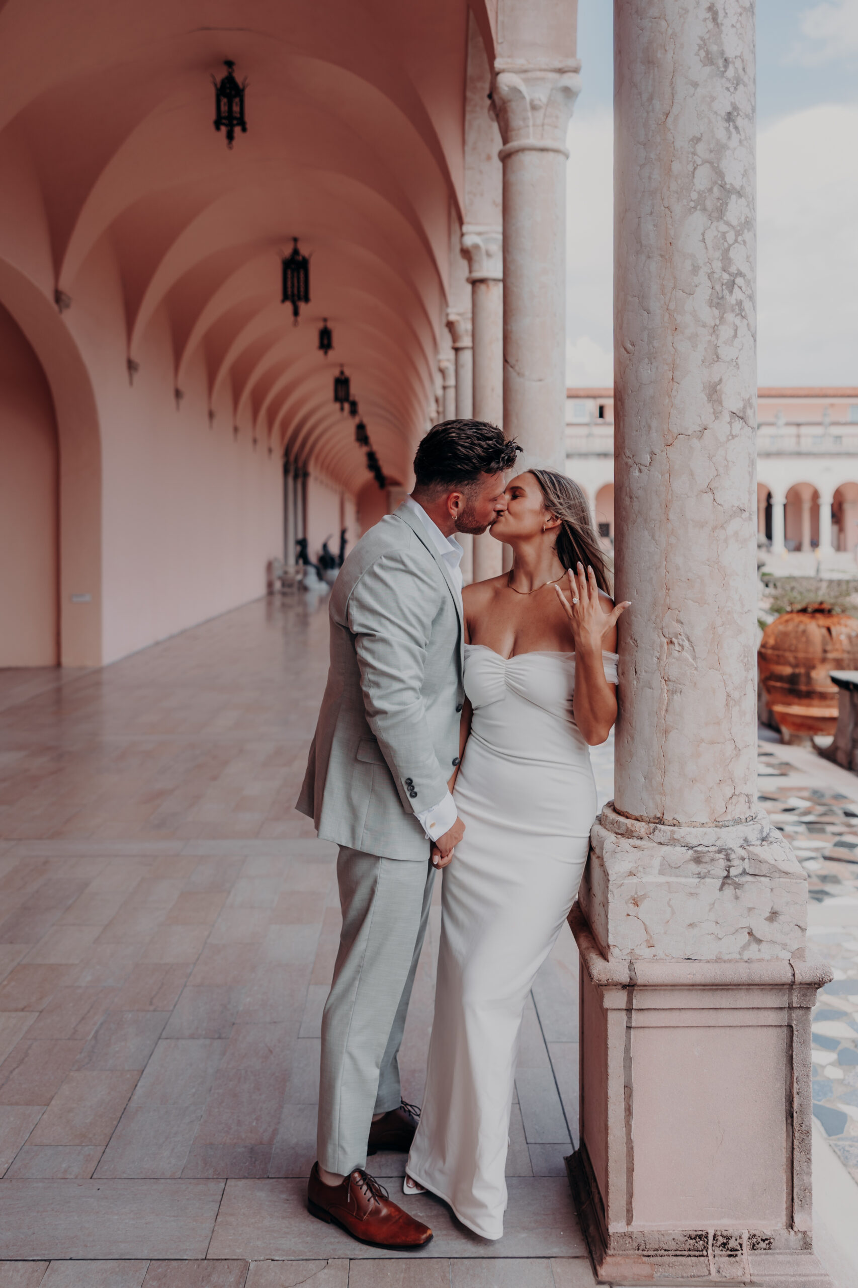 Nicole laughing with her head thrown back at the Ringling estate Sarasota Florida engagement session