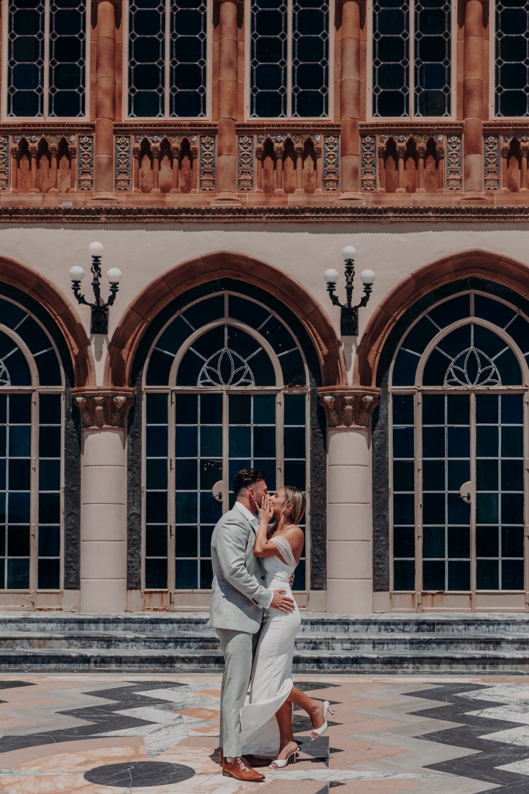 Final portrait of Nicole and Gabe at the Ringling Museum of Art Sarasota Florida by engagement photographer Angela Moon