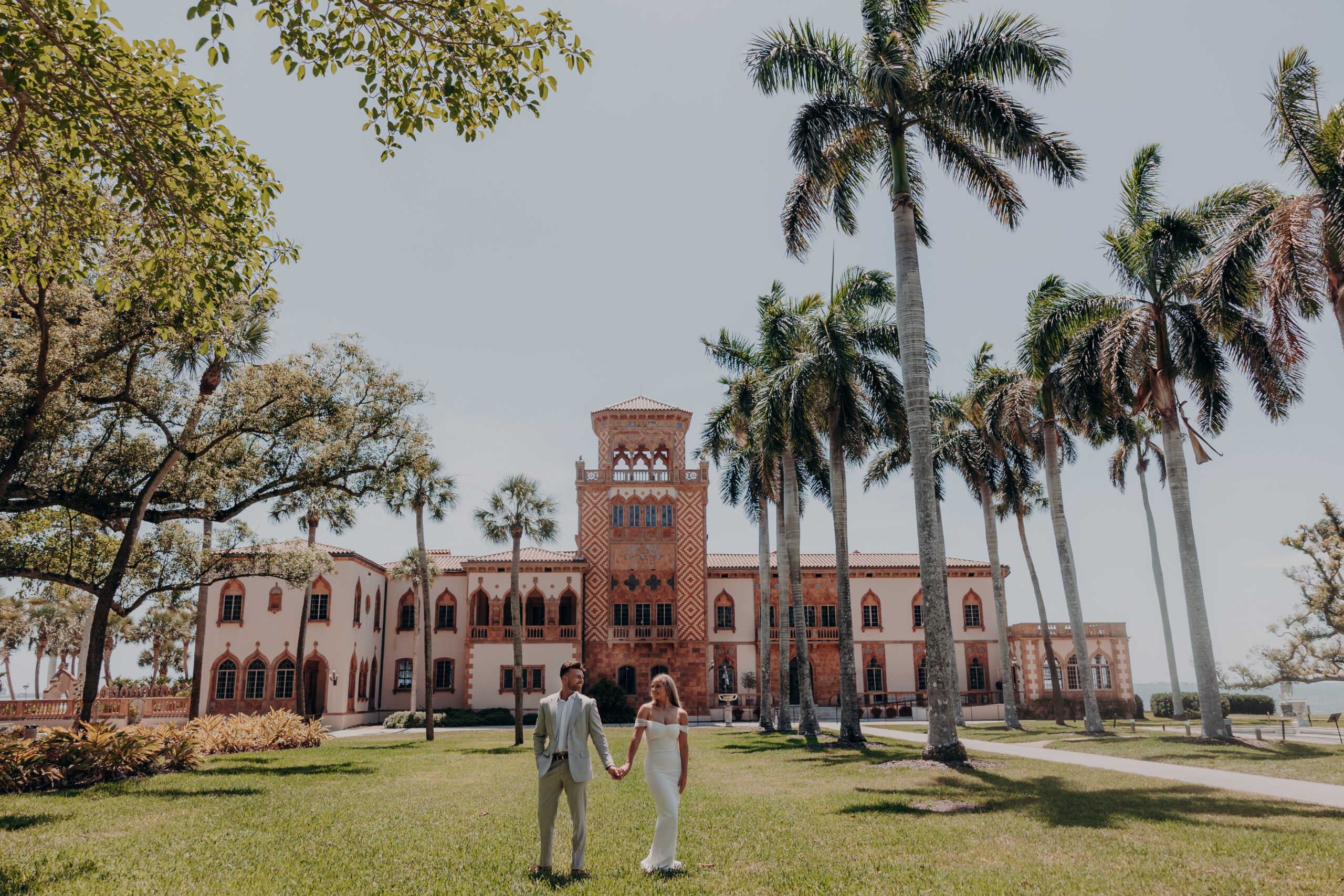 Beautiful wide shot of the couple at the Ringling estate bayfront Sarasota Florida engagement
