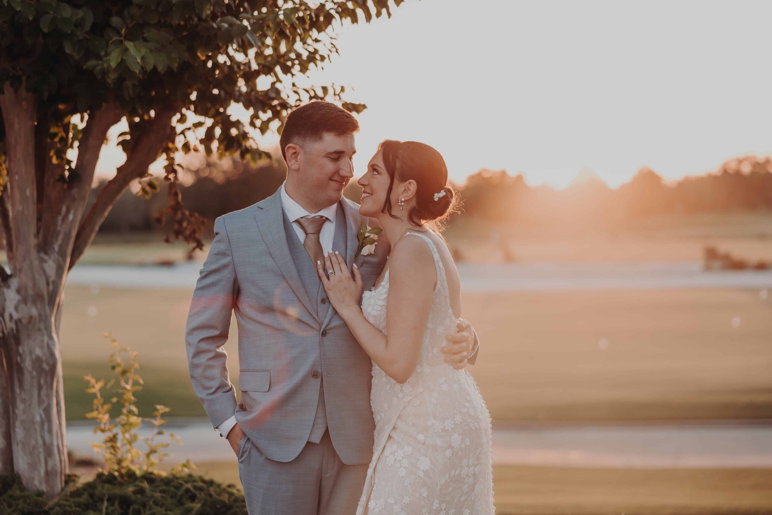 Our Lady of the Angels Catholic Church wedding Lakewood Ranch Golf and Country Club - Brianna and Ryan Whitley golden hour sunset portrait on the golf course