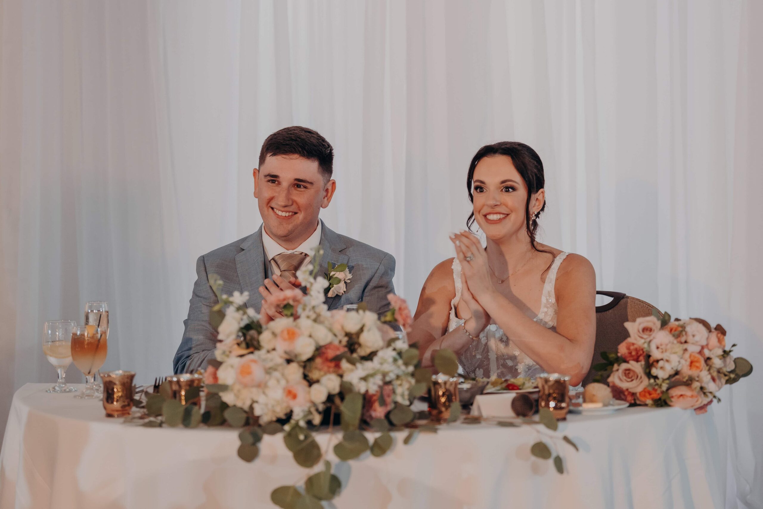 Bride Brianna wearing heart-shaped rhinestone sunglasses on the dance floor at Lakewood Ranch Golf and Country Club wedding reception