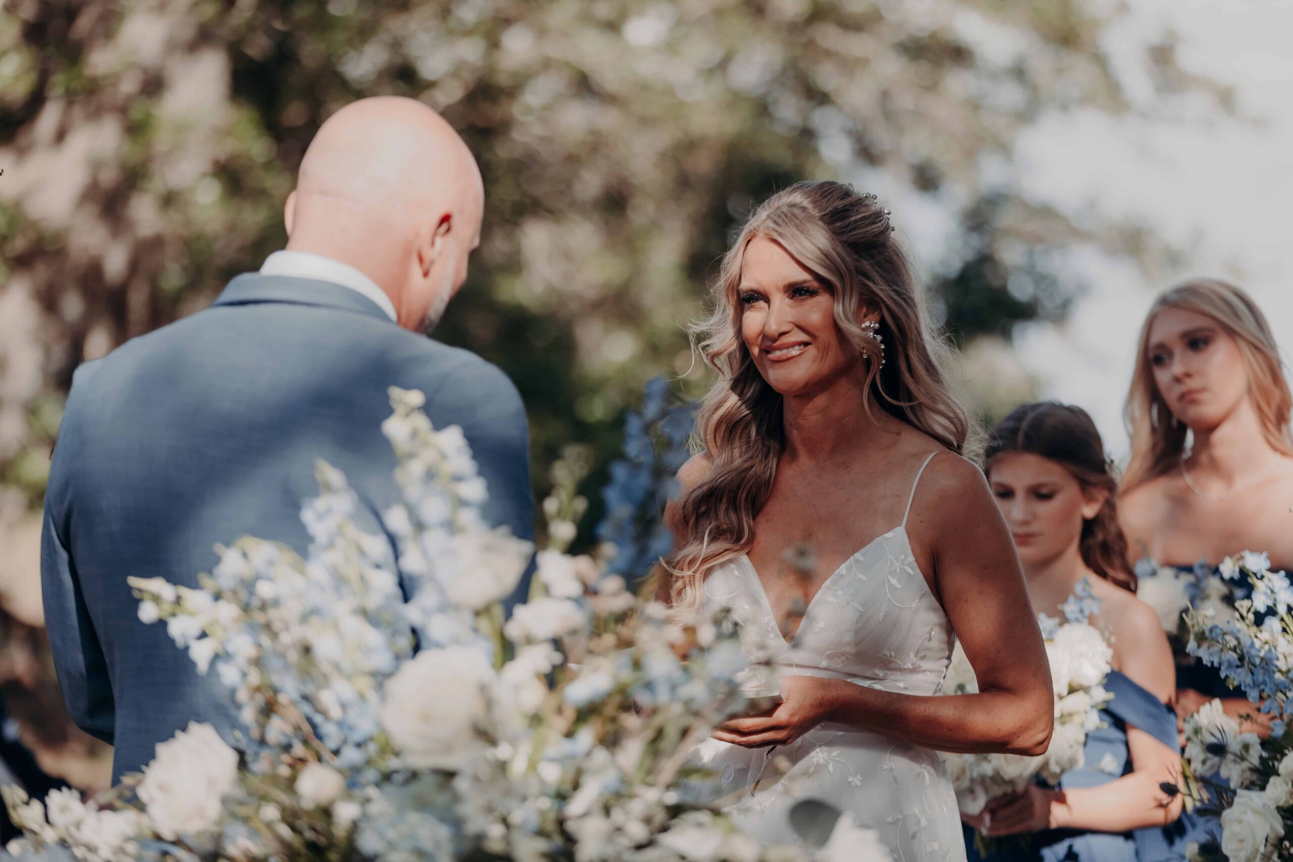 Emotional vow exchange moment between bride and groom at Brown's Grove Farm ceremony