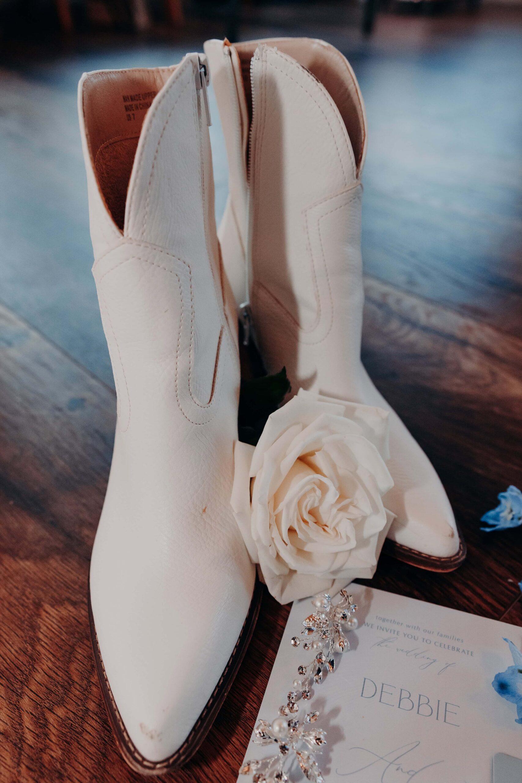 Bride's cowboy boots wedding day detail at Brown's Grove Farm wedding