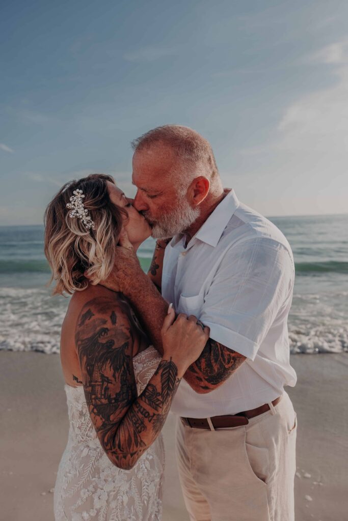 Candid family moment during Sarah and Jasen Siesta Key beach elopement portrait session
