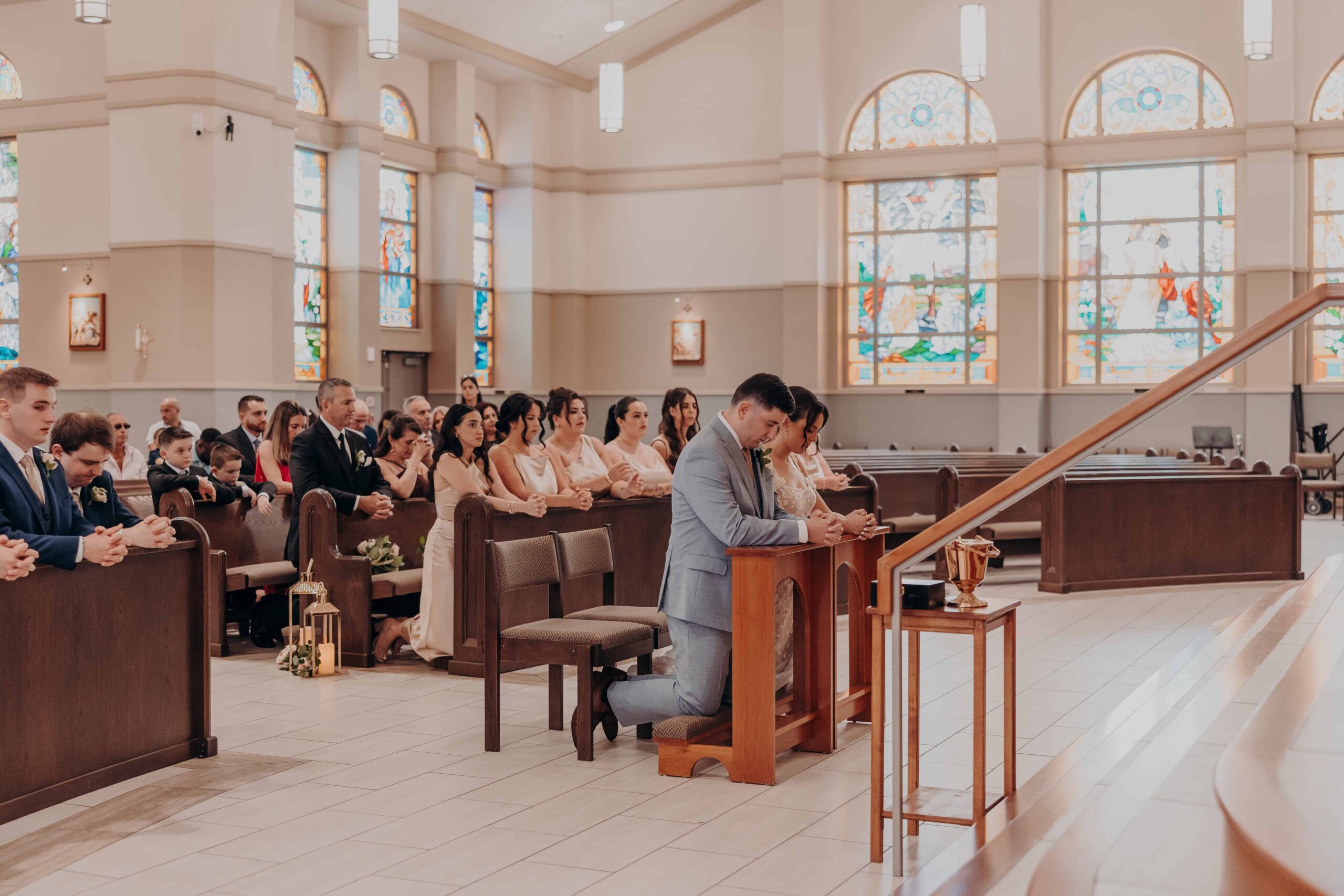 Emotional ceremony moment at Our Lady of the Angels Catholic Church wedding in Lakewood Ranch Florida