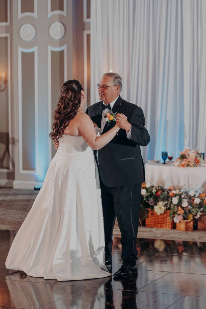 Father and daughter sharing emotional dance at Lakewood Ranch Golf and Country Club wedding reception