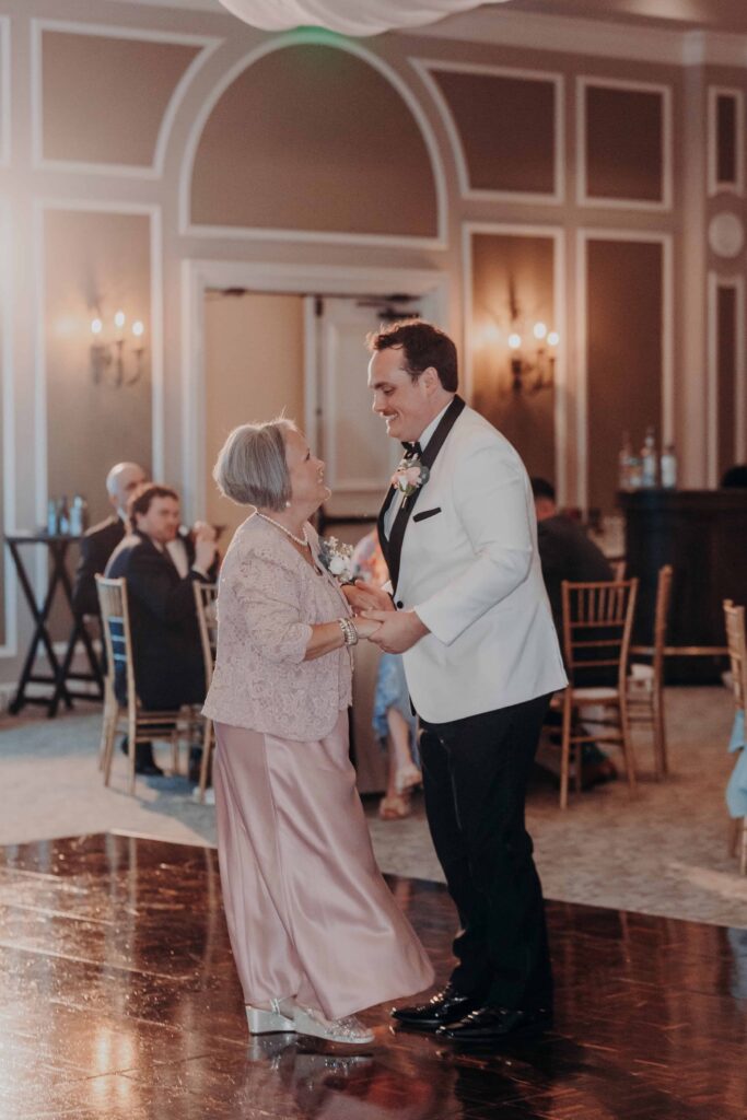 Groom dancing with his mother at Lakewood Ranch Golf and Country Club wedding reception