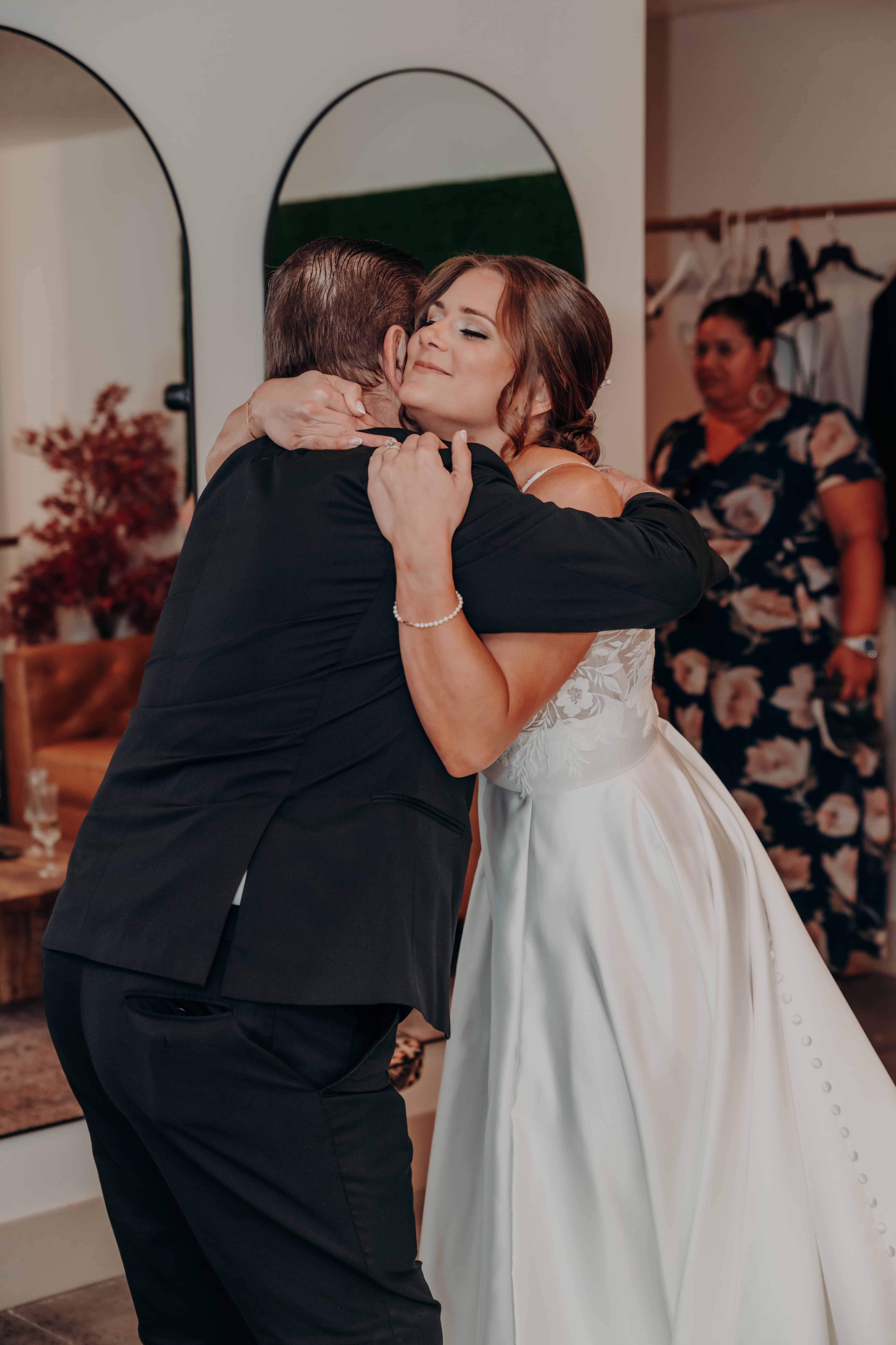 Hidden Acres wedding bride and father emotional first look hug