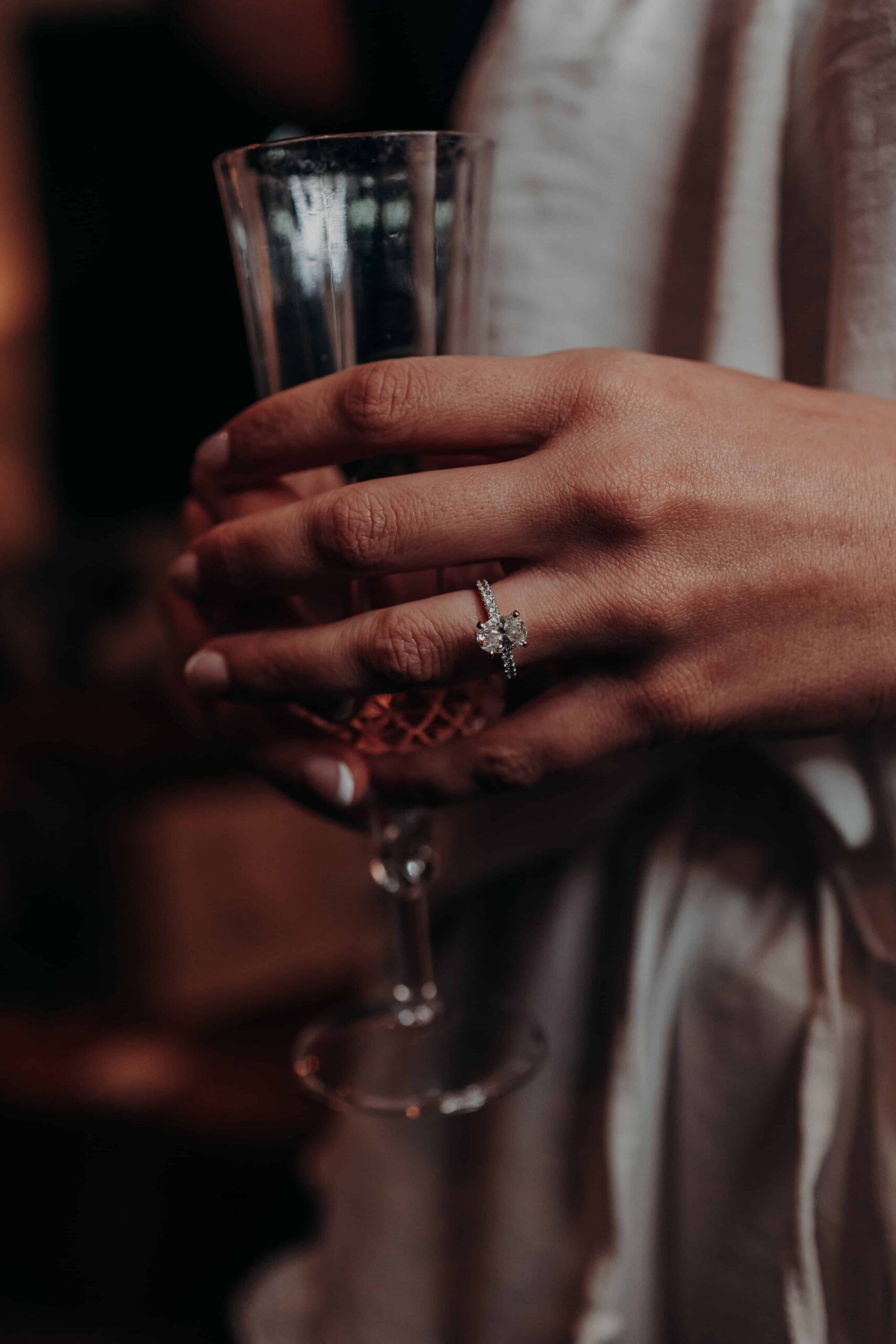 Hidden Acres wedding engagement ring and champagne getting ready