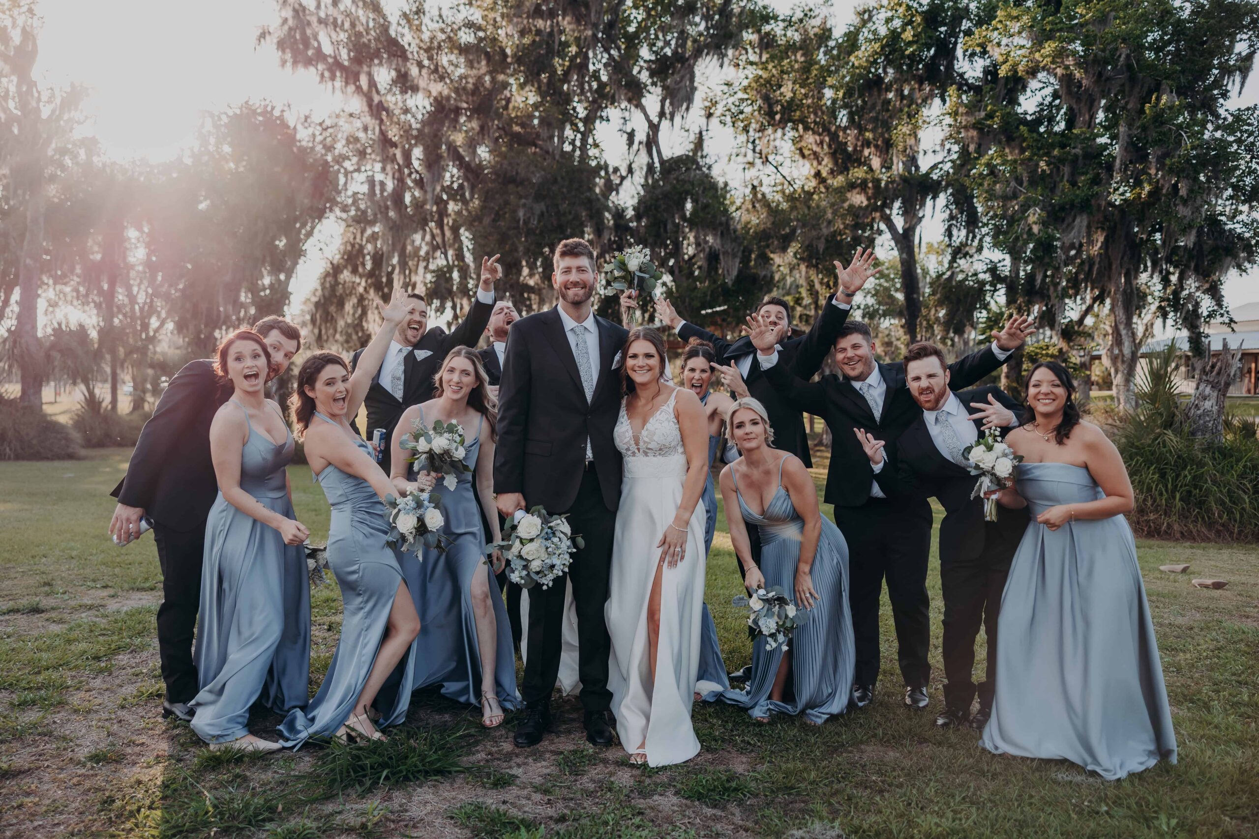 Hidden Acres wedding party fun shot golden hour Spanish moss trees