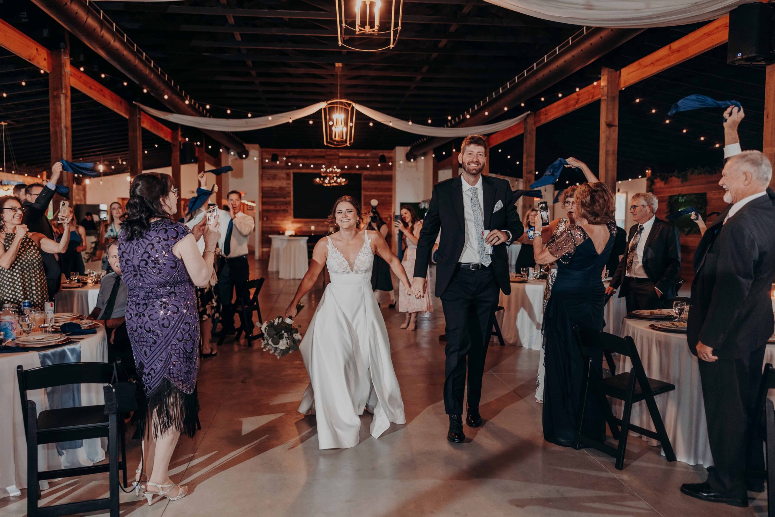 Hidden Acres wedding reception grand entrance bride and groom