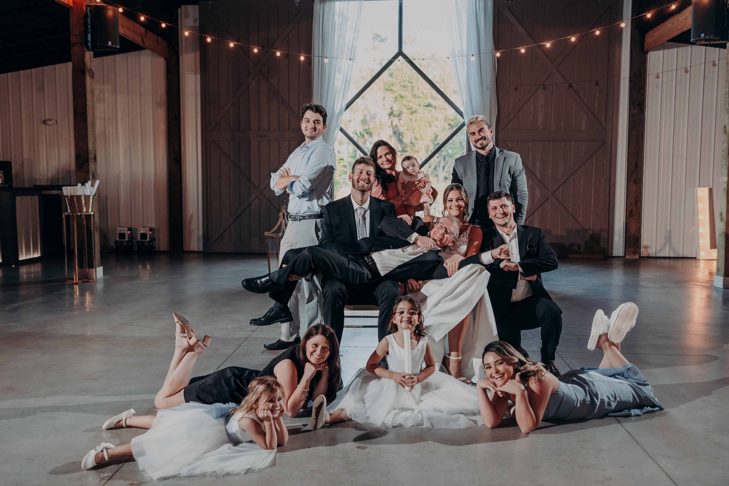 Hidden Acres wedding reception group photo on dance floor