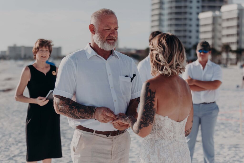 Newlyweds Sarah and Jasen just married walking on Siesta Key beach Sarasota