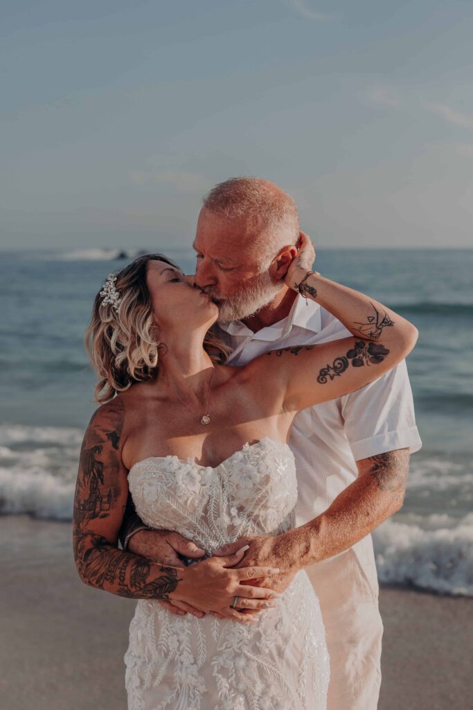 Sarah and Jasen close golden hour portrait on Siesta Key beach Sarasota Florida