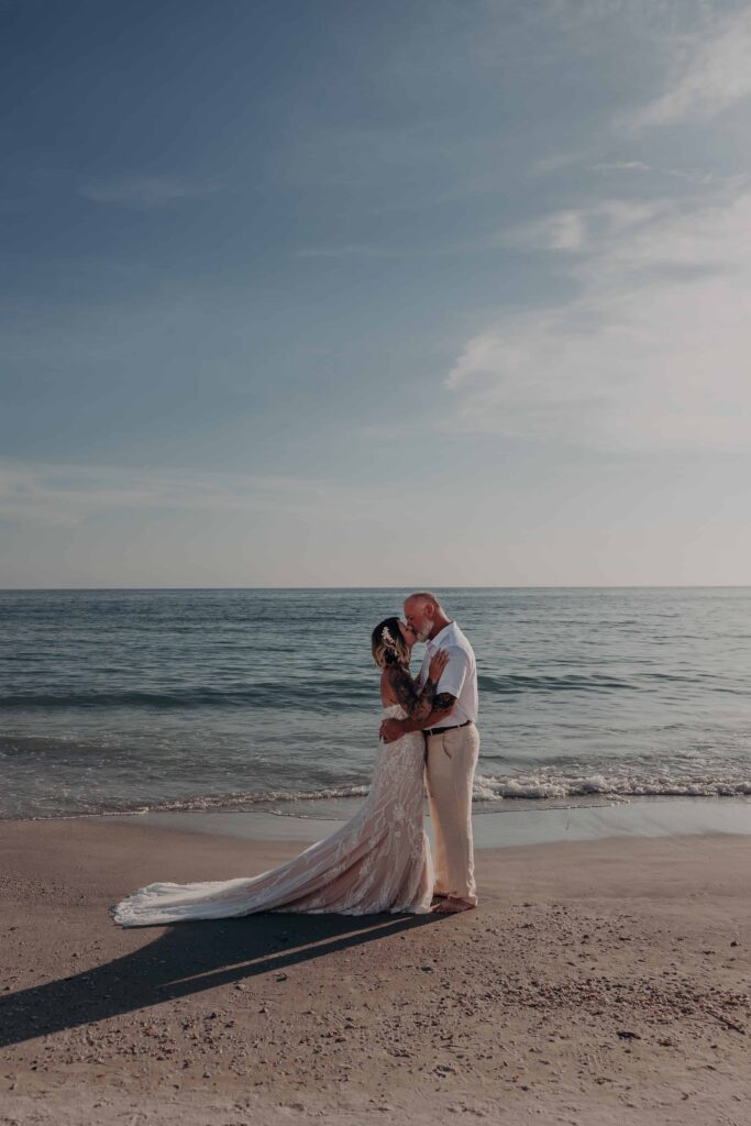 Sarah and Jasen romantic portrait at golden hour on Siesta Key beach Sarasota