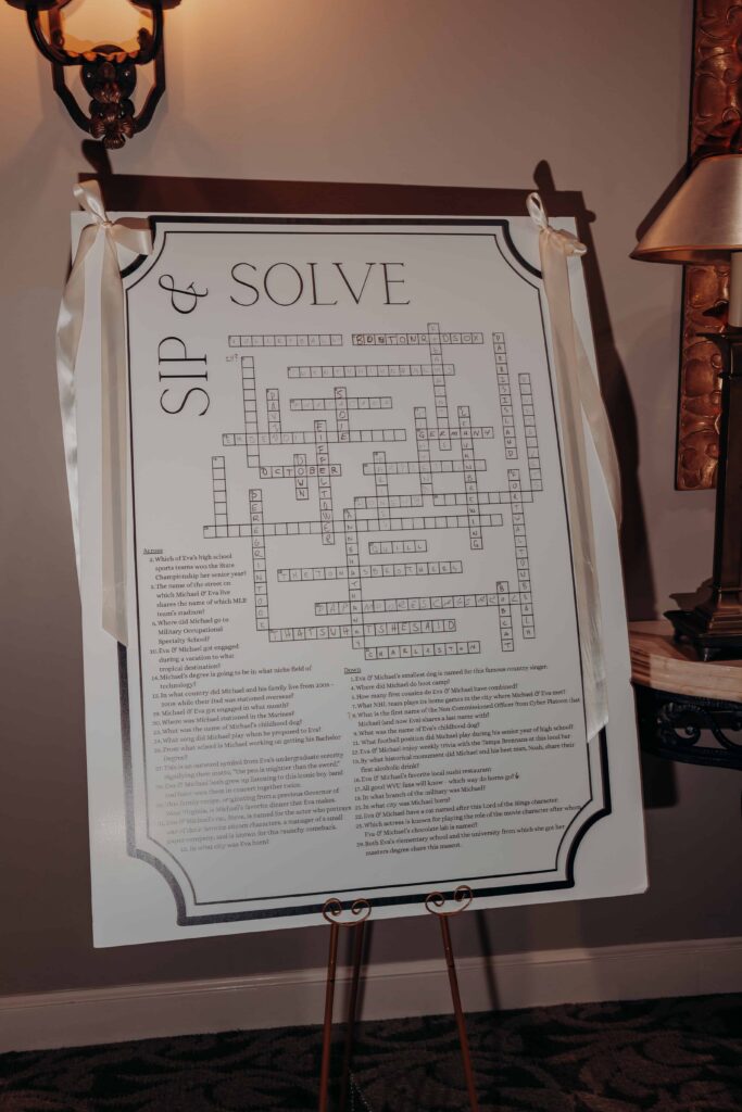 Sip and Solve personalized crossword puzzle sign all about bride and groom at Lakewood Ranch wedding reception
