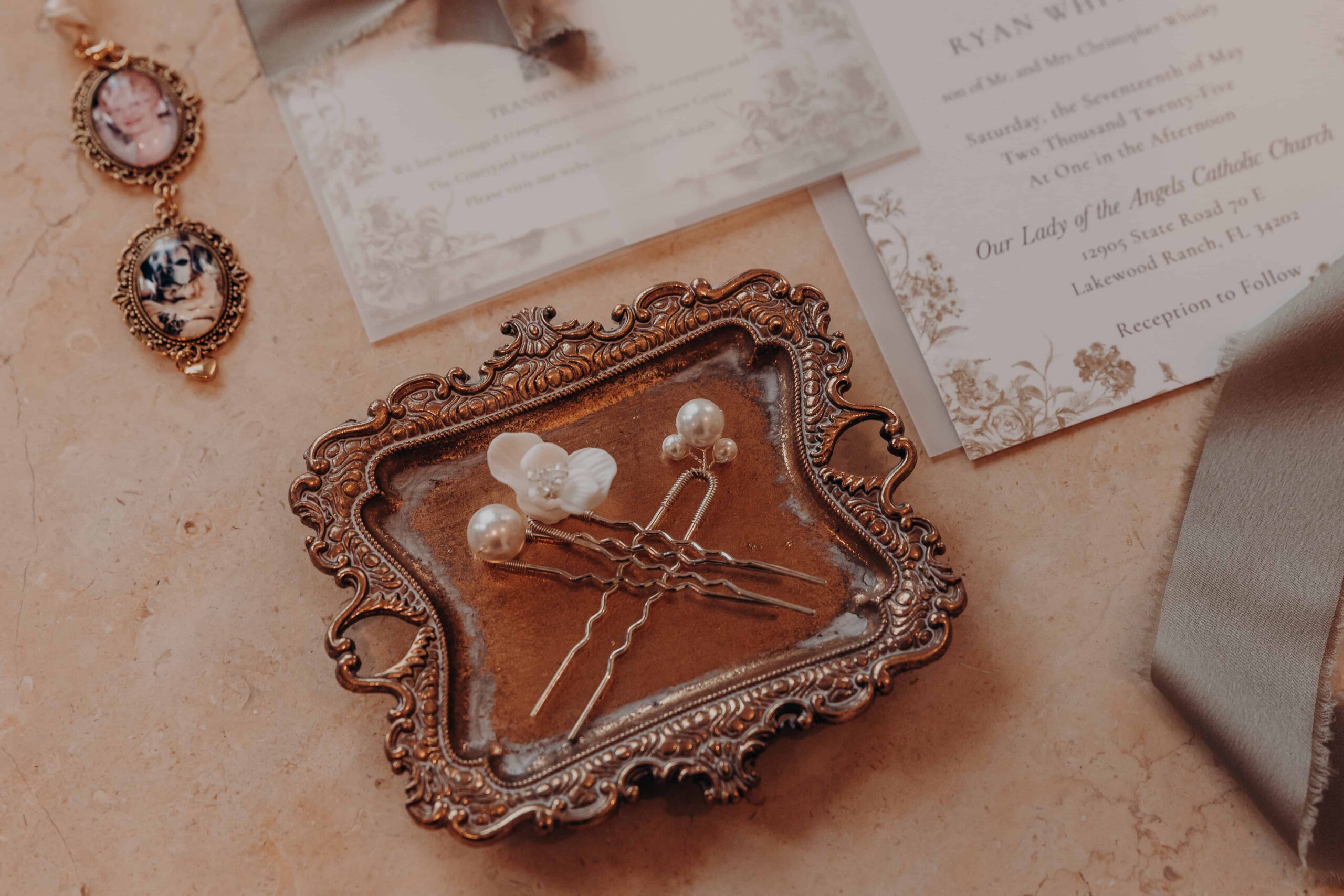 Wedding flat lay detail photo from Brianna and Ryan Catholic wedding in Lakewood Ranch Florida
