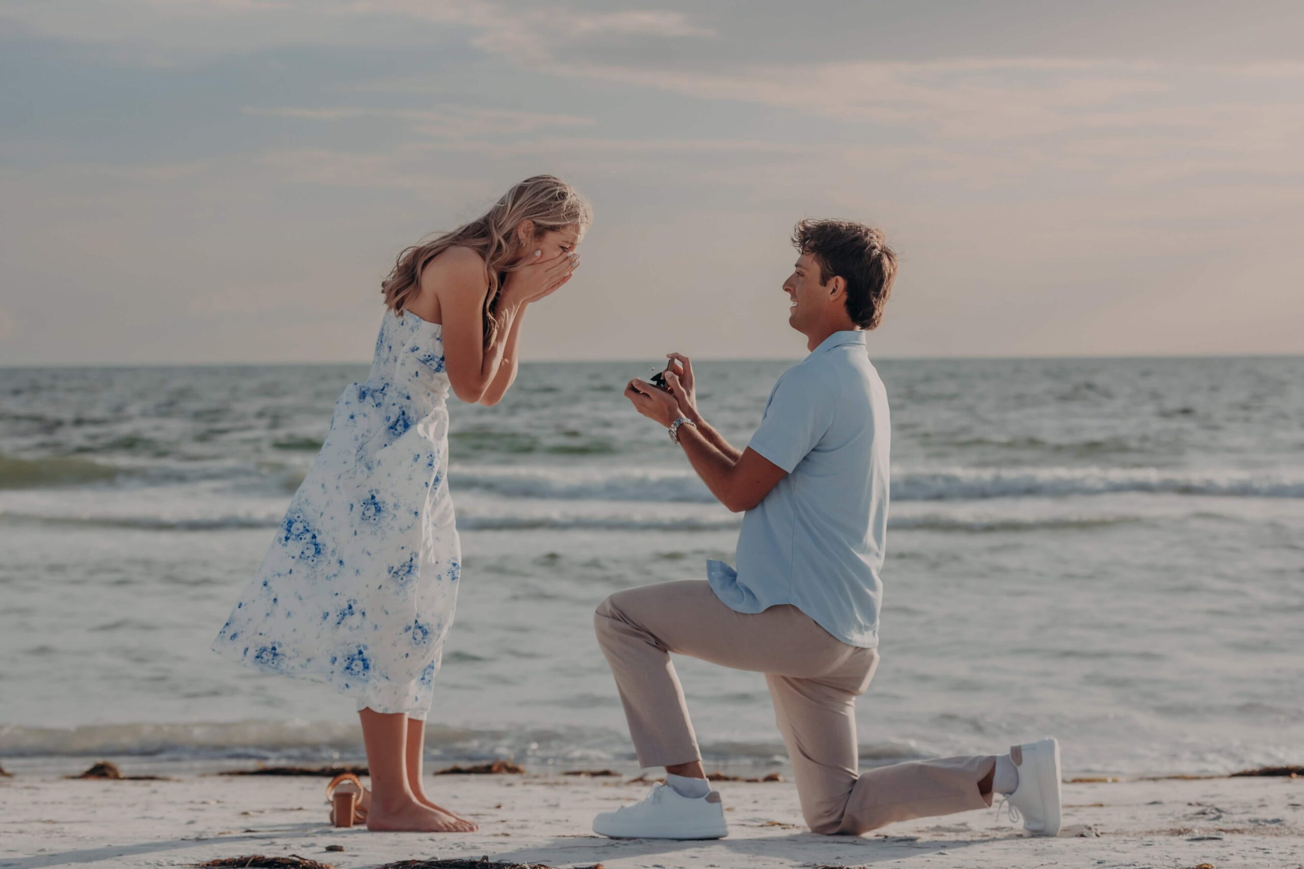 Quinten down on one knee during his Lido Beach proposal in Sarasota