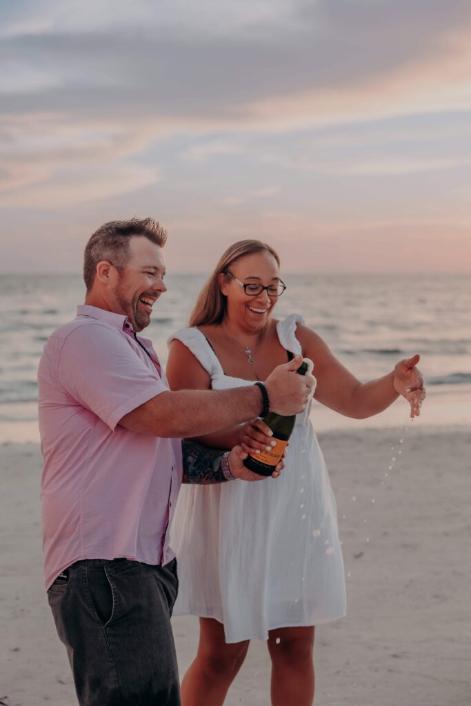 siesta key beach proposal champagne pop celebration sarasota
