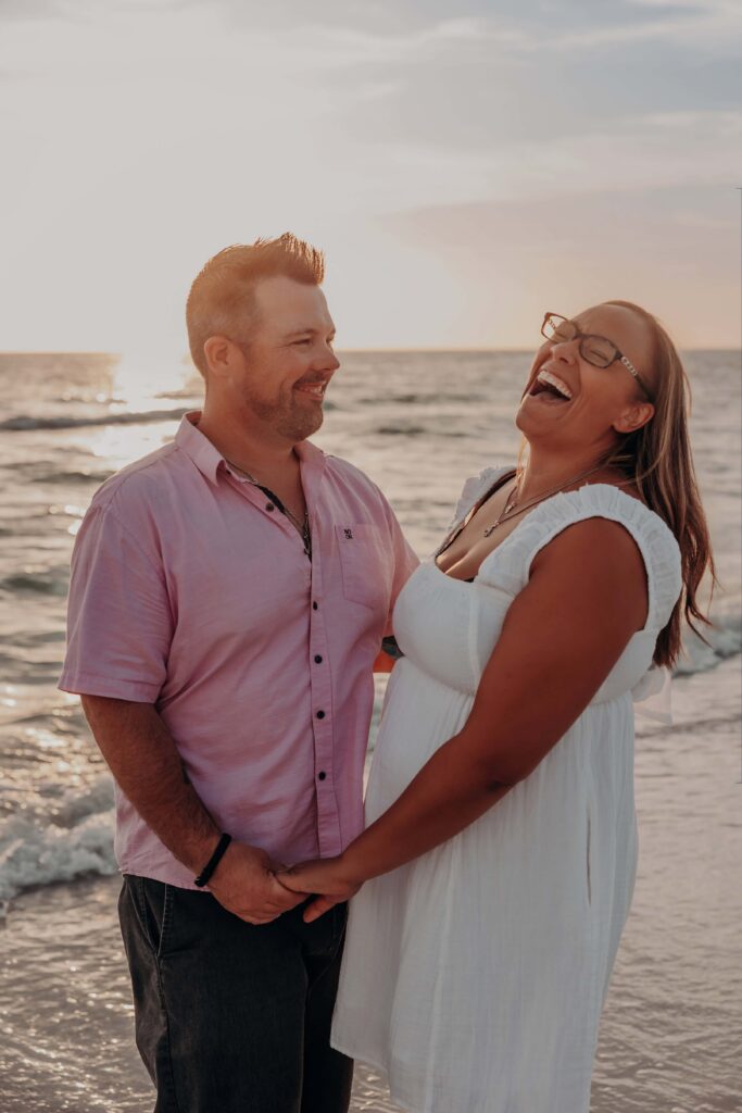 siesta key beach proposal couple belly laugh surf sarasota photographer