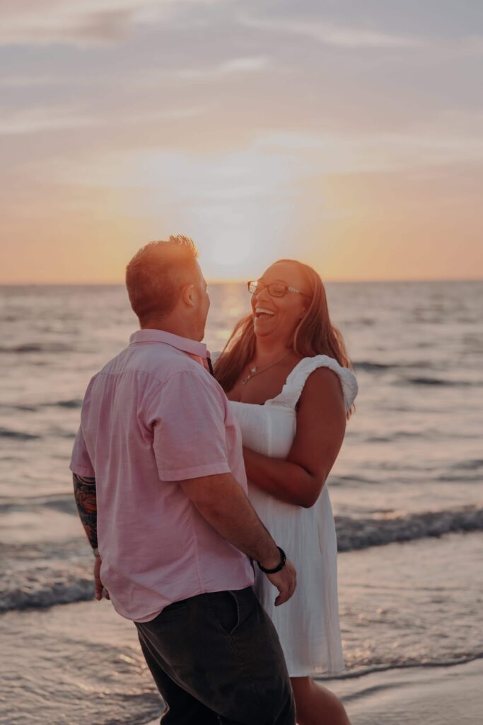 siesta key beach proposal couple dancing backlit sunset sarasota