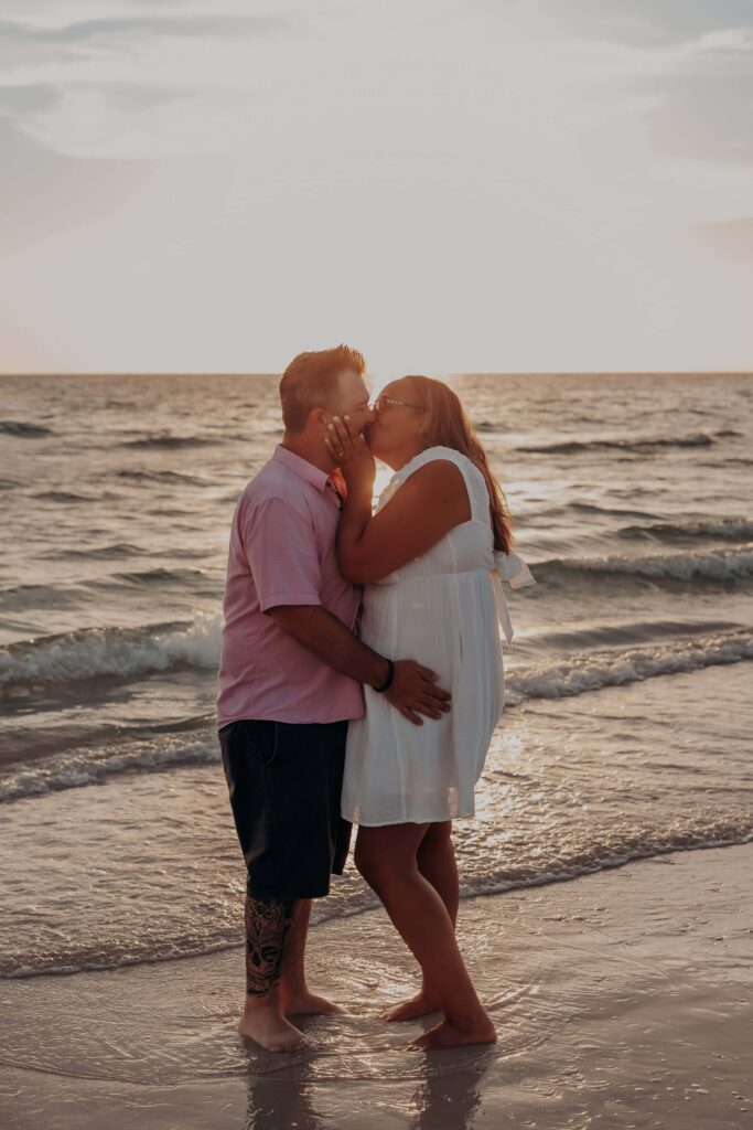 siesta key beach proposal couple kissing surf golden hour sarasota