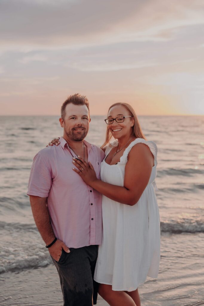 siesta key beach proposal couple portrait engagement ring pastel sky sarasota