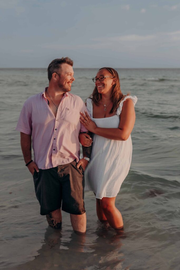 siesta key beach proposal couple whisper laugh sunset sarasota