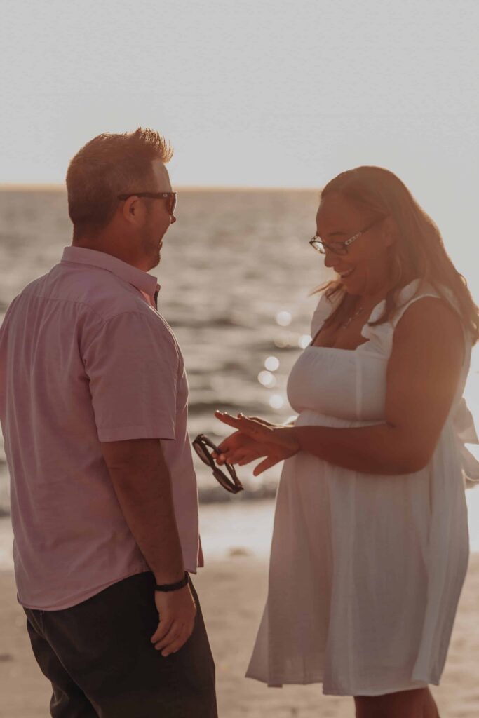 siesta key beach proposal ring golden light sarasota photographer