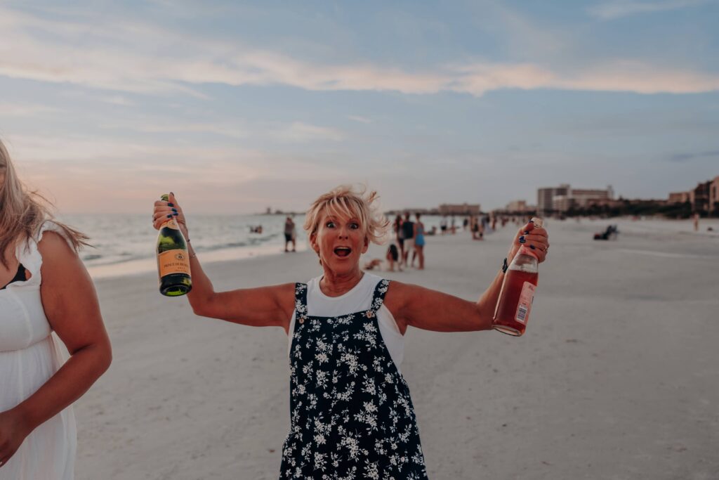 siesta key beach proposal surprise witness mom celebrating champagne sarasota