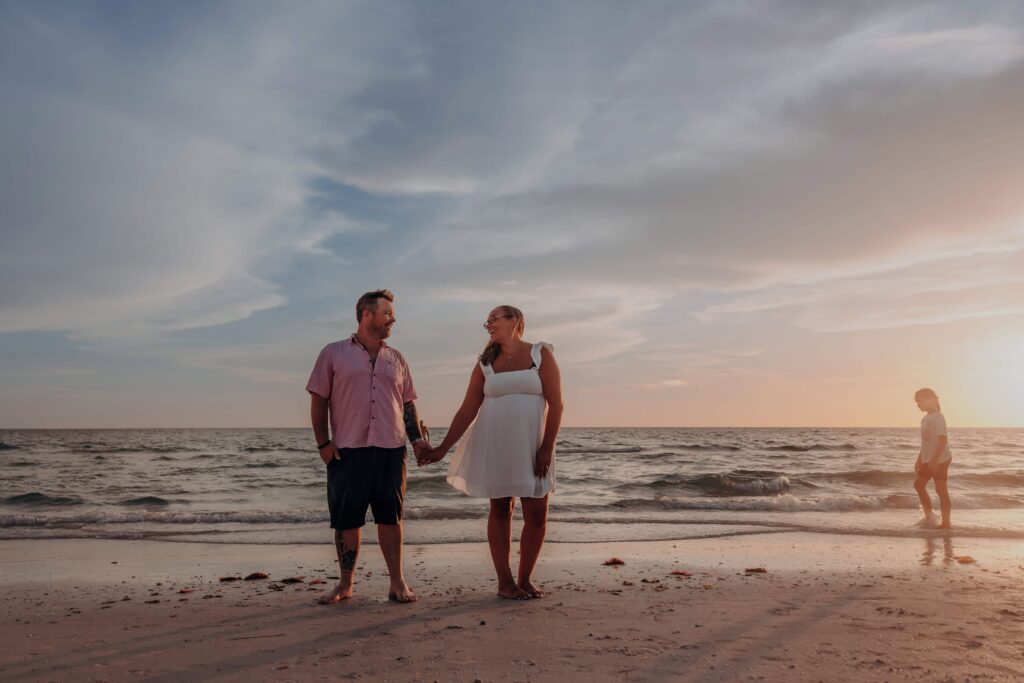 siesta key beach proposal wide family sunset silhouette sarasota