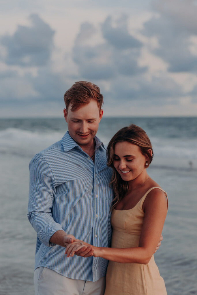 Michael and Regan smiling together after getting engaged at Zota Beach Resort