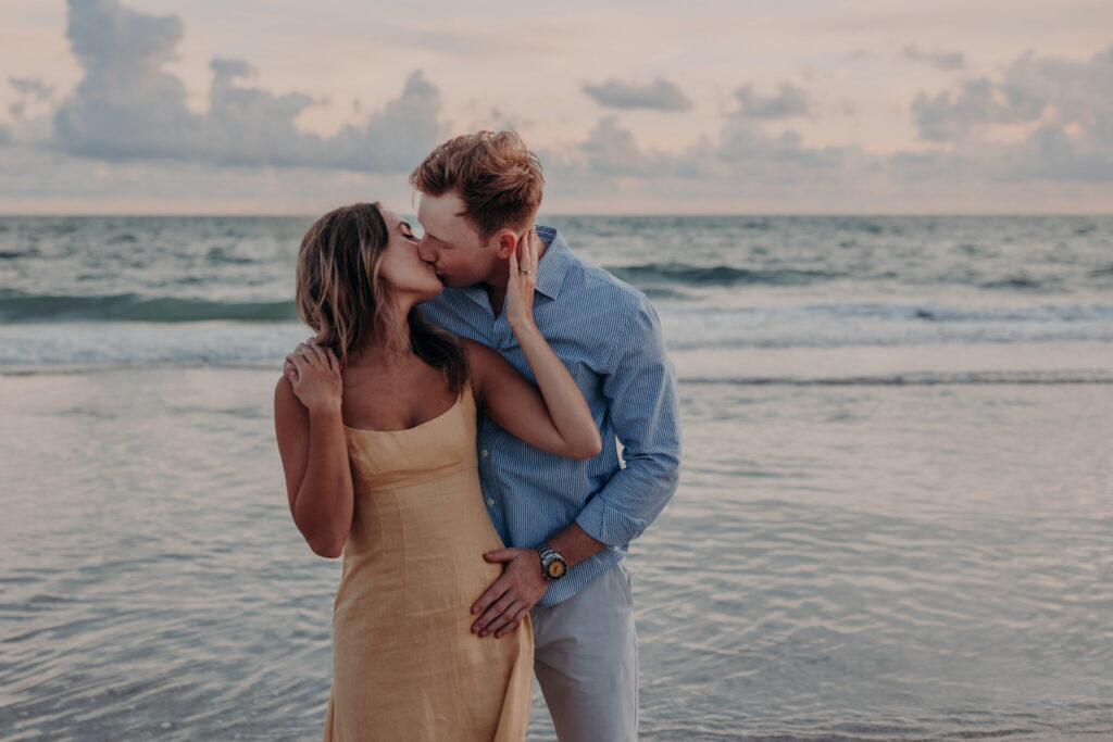 Michael and Regan smiling together after getting engaged at Zota Beach Resort
