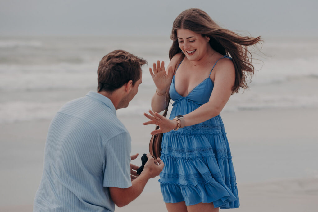 Ryan and Olivia laughing on the beach after getting engaged (4)