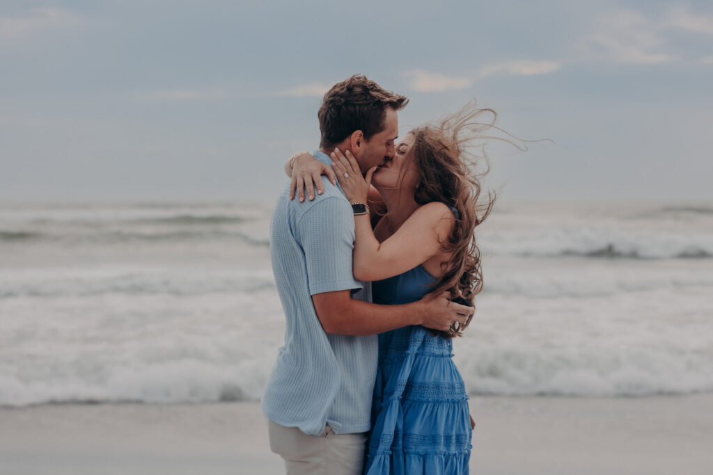 Ryan and Olivia embracing on the beach after the proposal (9)