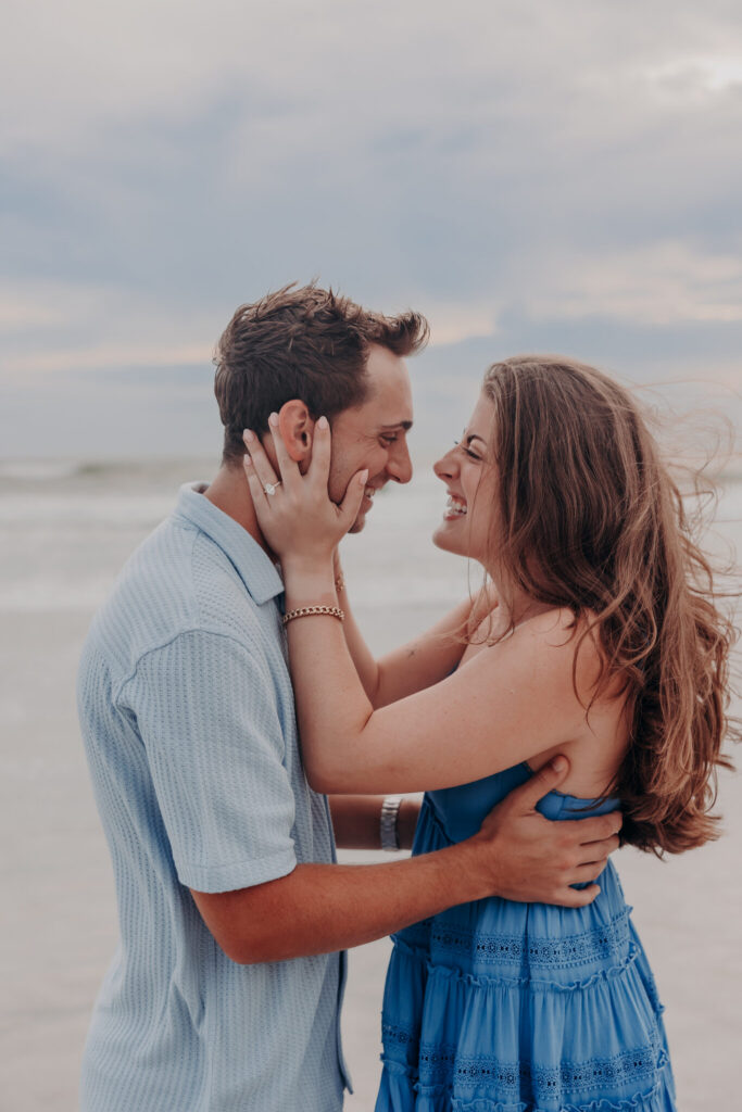 Ryan and Olivia embracing on the beach after the proposal (19)